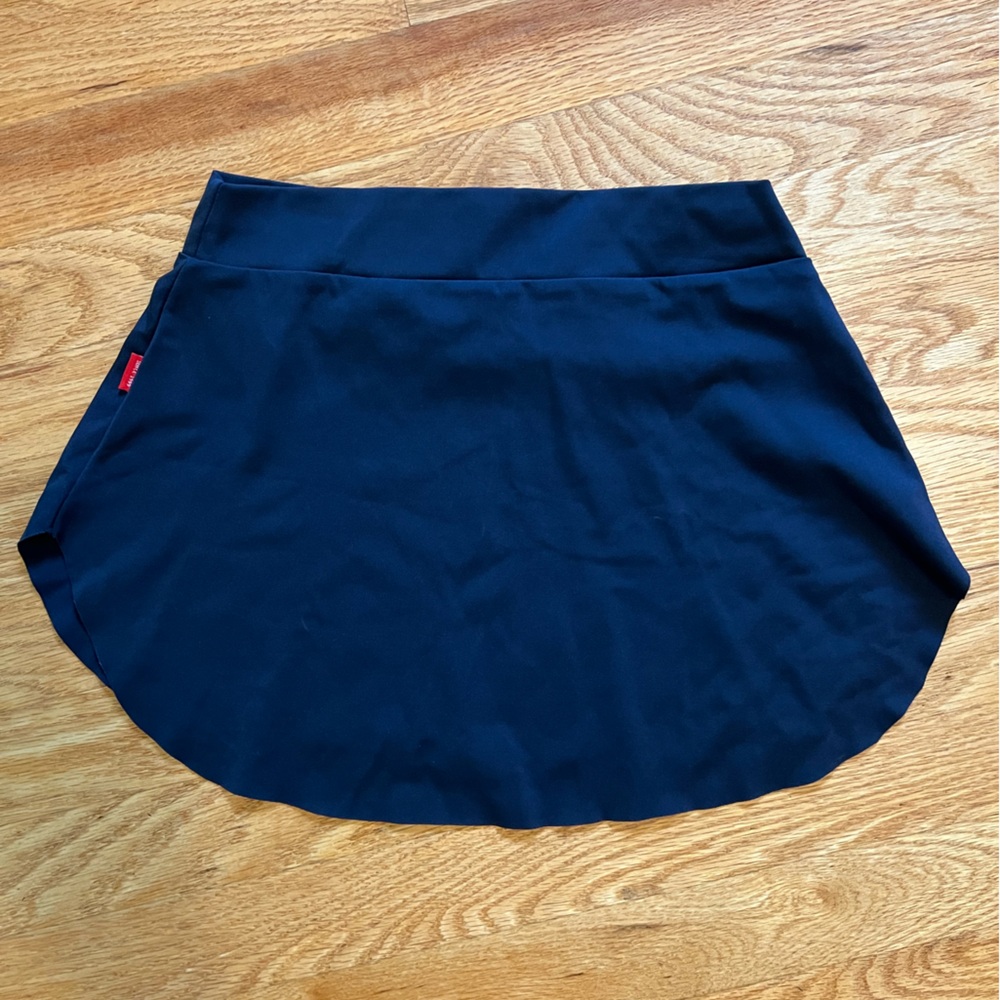 Two ballet skirts, one Eleve flowered, one navy Daydance.